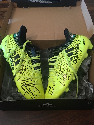 LOT 65: Jonny Williams signed football boots
