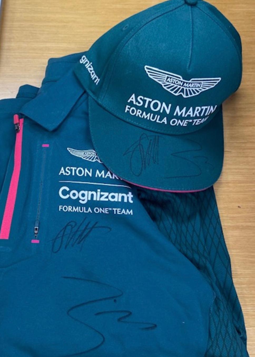 Aston Martin Formula 1 cap and shirt signed by Lance Stroll and Sebastian Vettel